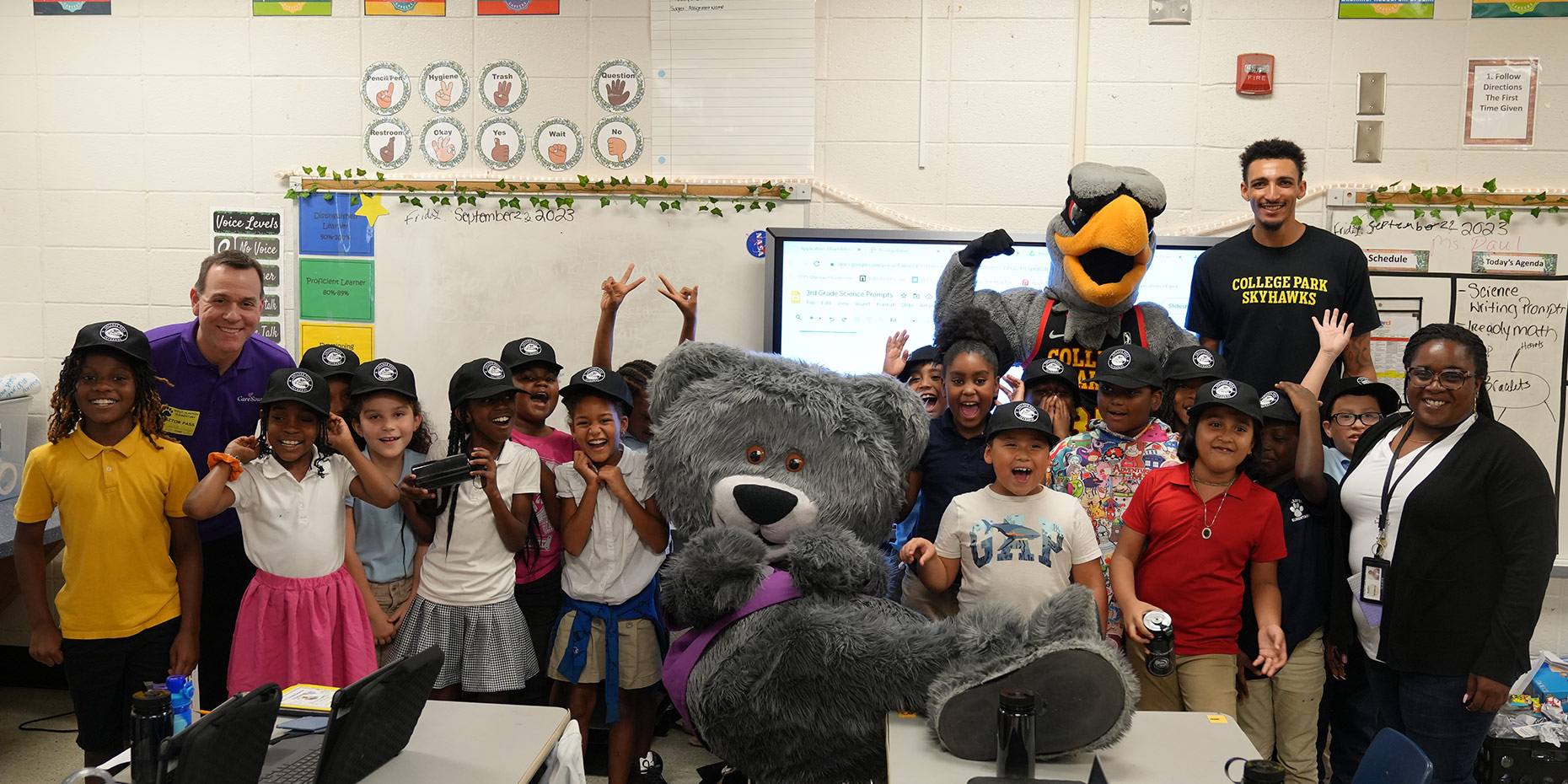 Group Classroom Photo College Skyhawks Cuddles the Care Source Bear