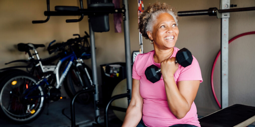 Woman Exercising Home Gym Smiling