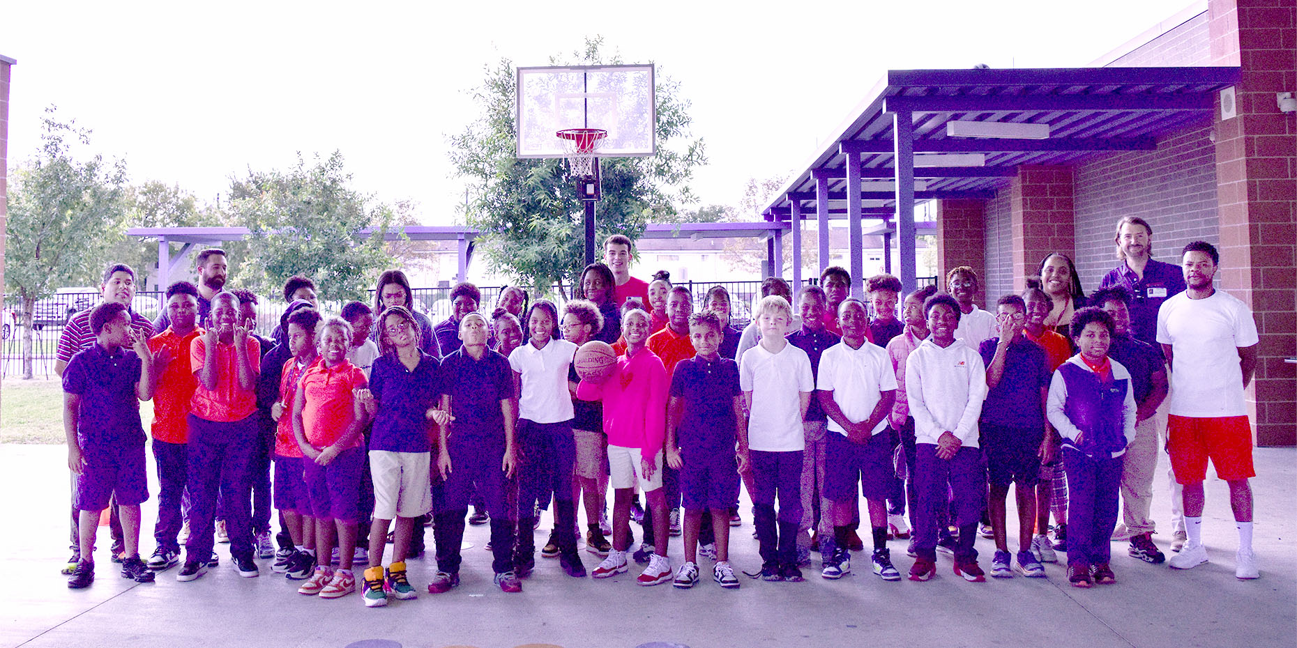 Houston youth spent time with University of Houston Men's Basketball player Ryan Elvin during “Third Ward Hoops.”