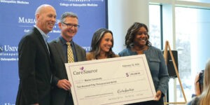 Steve Smitherman, Kenith Britt, Amanda Wright and Cameual Wright were present for a $250,000 donation from CareSource to establish the CareSource Rural Health Endowed Scholarship.