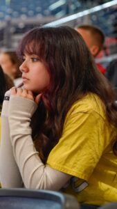 Young woman watching event