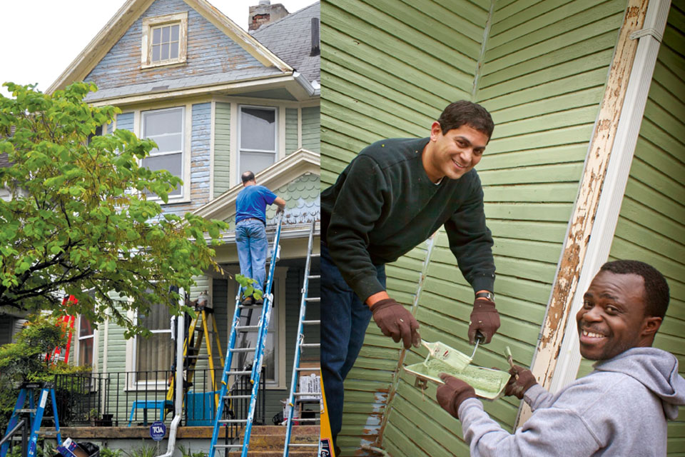 Employees Painting a House